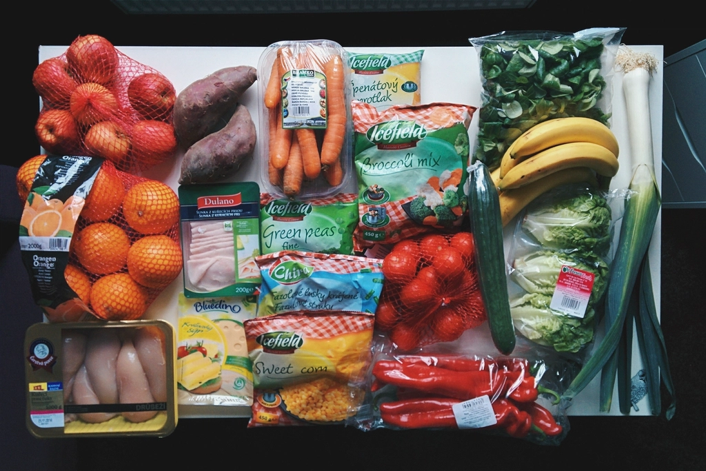 A spread of fresh, healthy groceries laid out on a table